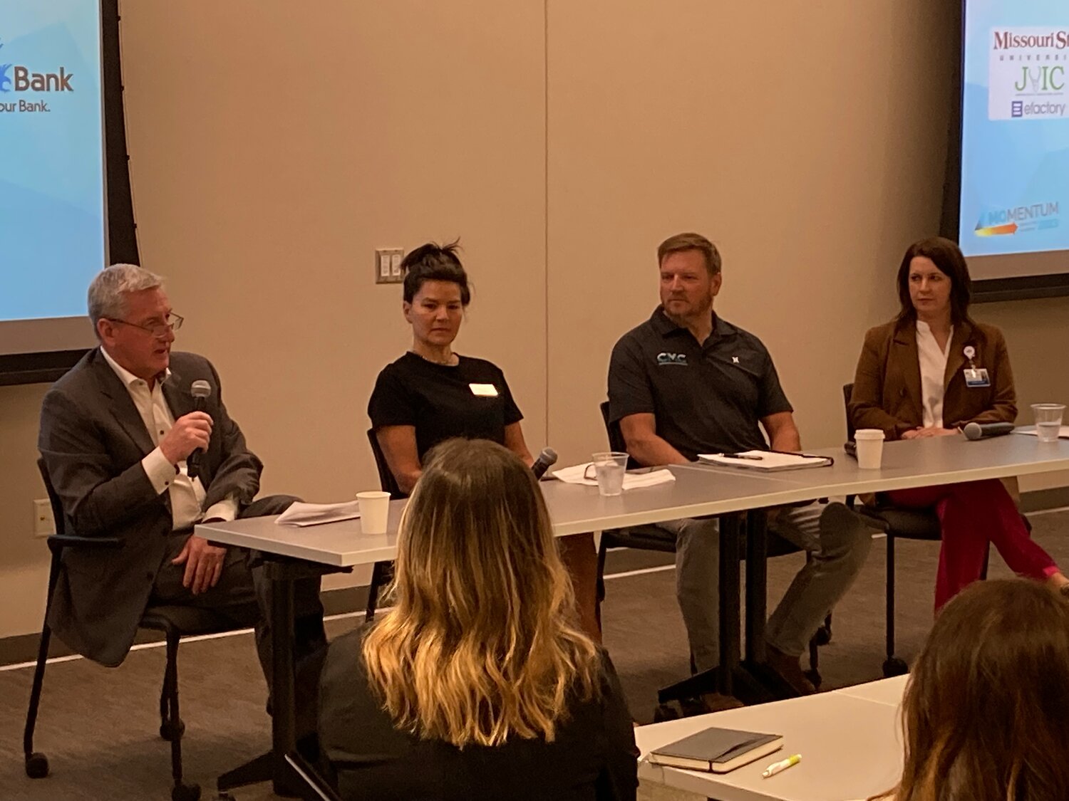 TALENT ATTRACTION: At left, Mark McNay of SMC Packaging Group speaks on ways his company attracts talent, as panelists Shelly Phillips, Lee Loveall and Katelyn Lenhart listen.
